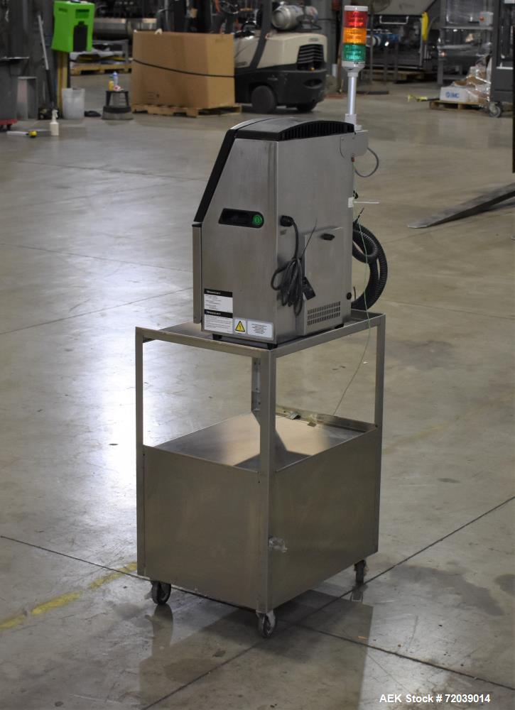 Used Video Jet Ink Jet Coding Machine, Model 1510. Capable of speeds up to 279 m/min (914 ft/min). Has a single print head with up to five lines of type. Communications: Ethernet and RS-232 Serial. 1...